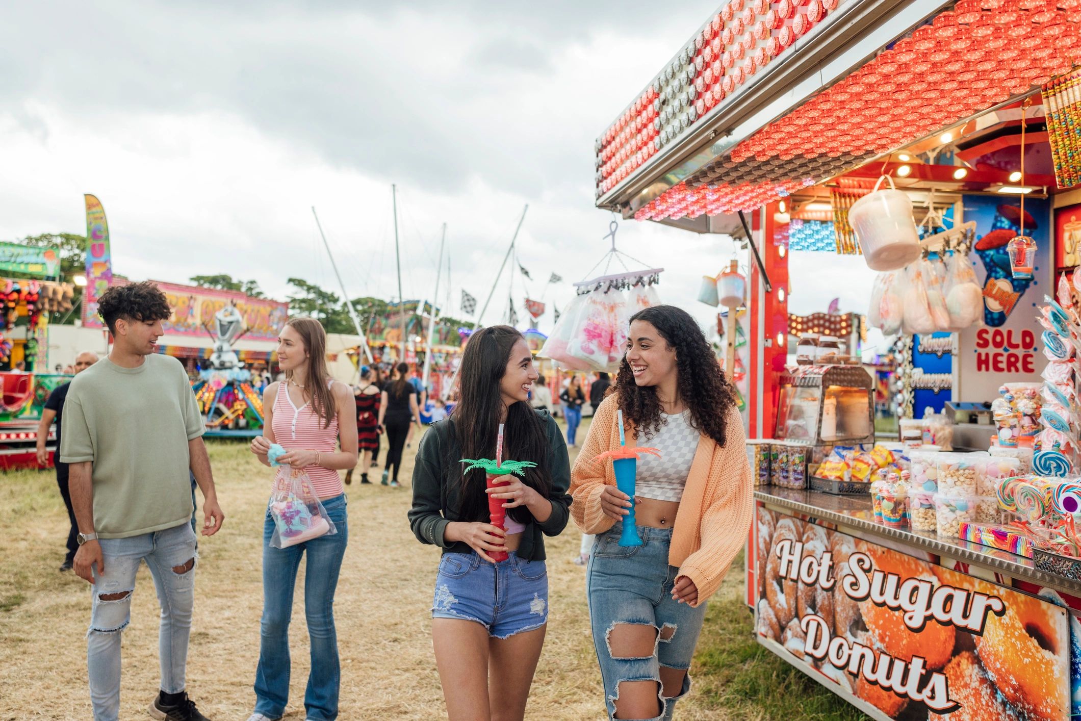 Guests enjoying a lively fair-style event atmosphere